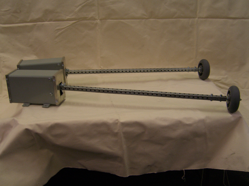 Underbelt Material Sensing Device